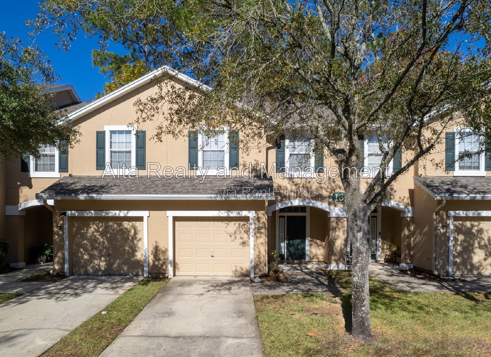 Charming 3BR Townhouse with Garage & Private Patio – Prime Location Near NAS JAX property image