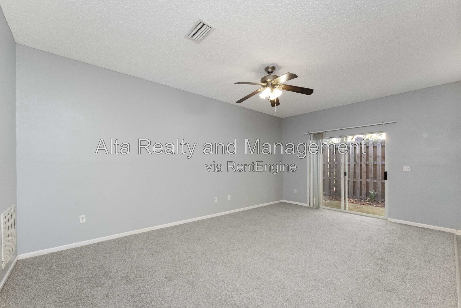 Charming 3BR Townhouse with Garage & Private Patio – Prime Location Near NAS JAX property image