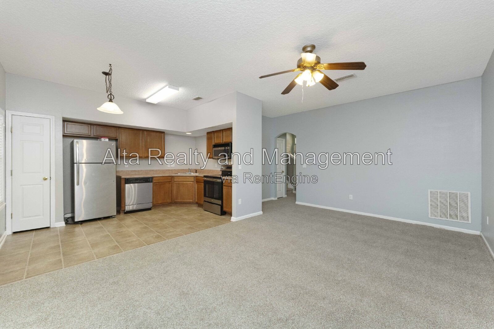Charming 3BR Townhouse with Garage & Private Patio – Prime Location Near NAS JAX property image