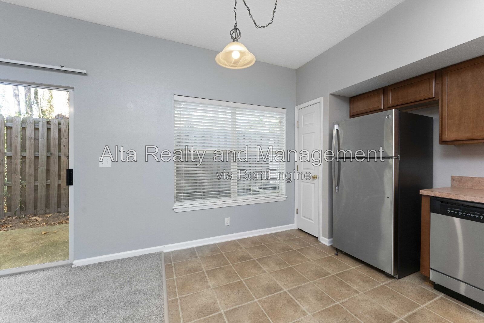 Charming 3BR Townhouse with Garage & Private Patio – Prime Location Near NAS JAX property image