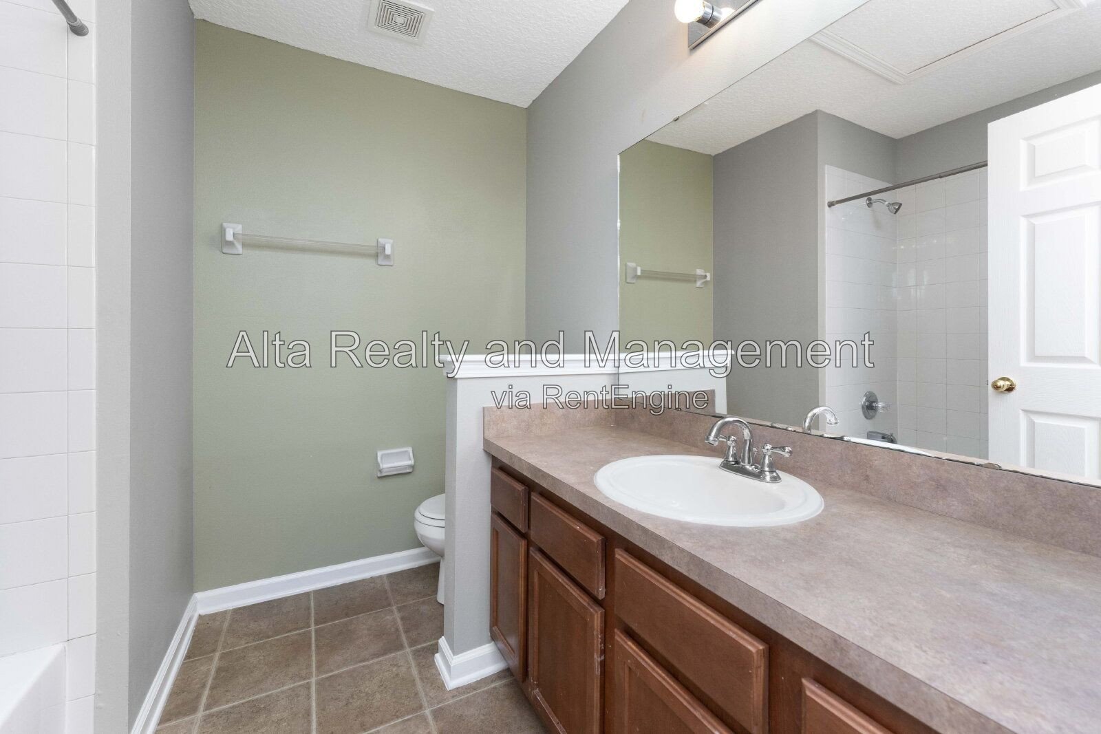 Charming 3BR Townhouse with Garage & Private Patio – Prime Location Near NAS JAX property image